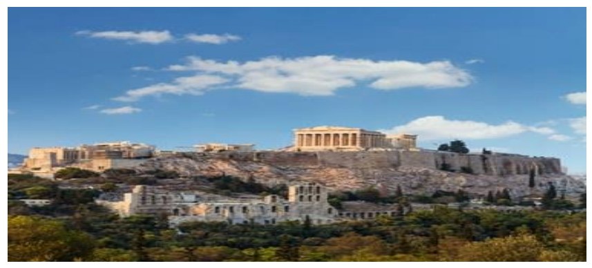 Fotografia da Acrópole de Atenas, com ruínas de templos gregos sobre uma colina, sob céu azul com nuvens.