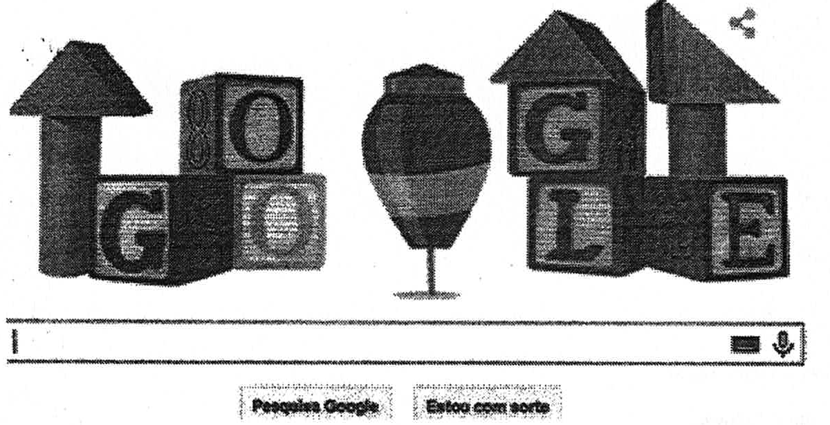 Doodle do Google para o Dia das Crianças: blocos de madeira formando o nome Google e um pião no lugar de uma das letras, acima da barra de busca com os botões “Pesquisa Google” e “Estou com sorte”.