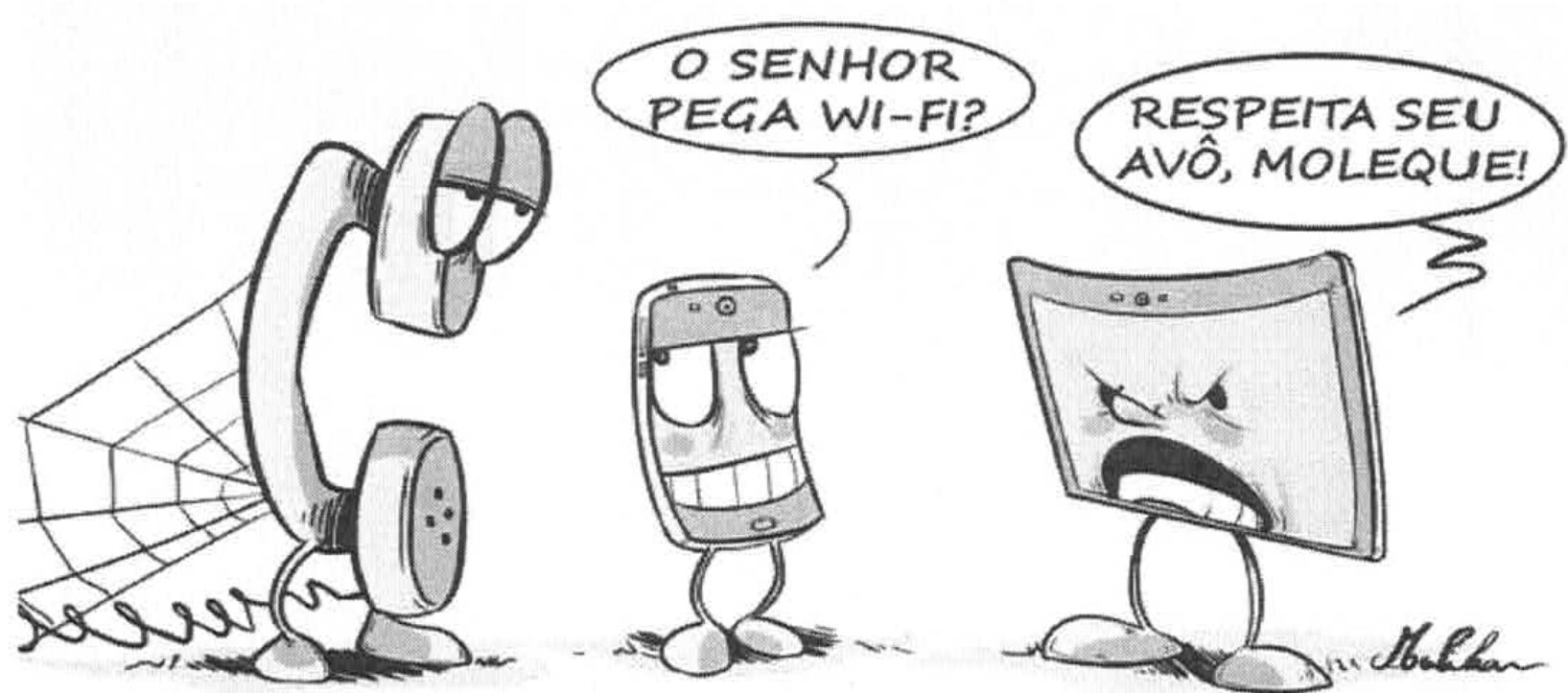 Charge com três aparelhos personificados lado a lado: à esquerda, um telefone antigo de gancho, com olhos sonolentos e teia de aranha ao lado; ao centro, um smartphone sorridente, que pergunta “O senhor pega wi-fi?”; à direita, um tablet de expressão zangada, que diz “Respeita seu avô, moleque!”.