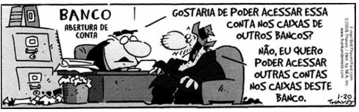 Charge: agência bancária com a placa “Banco — Abertura de conta”. Um cliente, sentado diante de um funcionário à mesa, pergunta: “Gostaria de poder acessar essa conta nos caixas de outros bancos?”, e o outro responde: “Não, eu quero poder acessar outras contas nos caixas deste banco.”