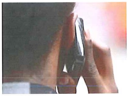 Fotografia ilustrativa de uma pessoa falando ao celular.