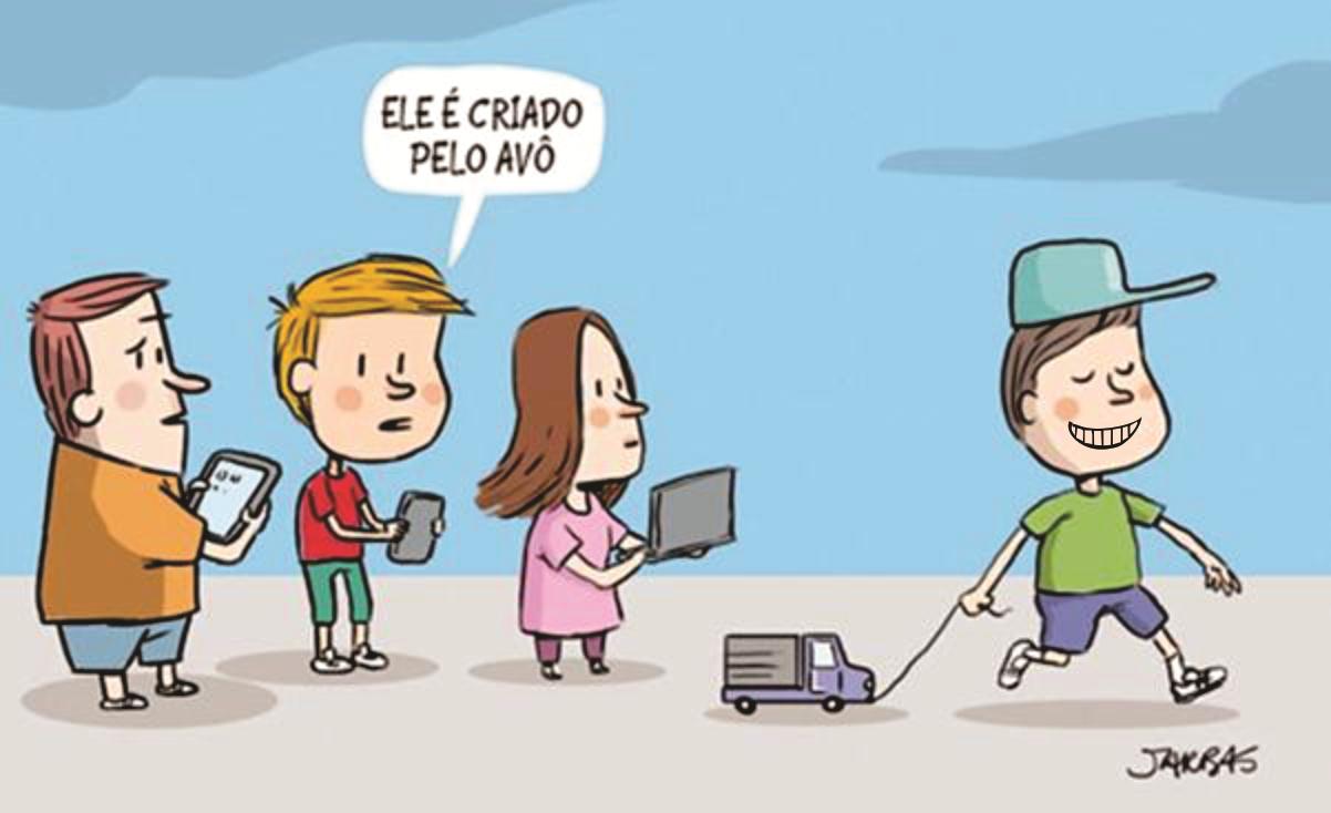 Charge: três crianças lado a lado olham para aparelhos eletrônicos (dois celulares e um notebook); uma delas diz, em um balão de fala, “Ele é criado pelo avô”, referindo-se a um menino de boné que passa sorrindo, puxando por um barbante um caminhãozinho de brinquedo. Assinatura: Jarbas.