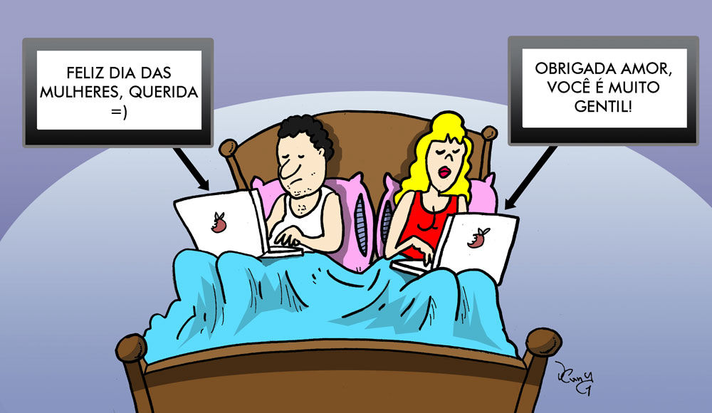 Charge: casal deitado na cama, cada um usando seu notebook. Balão de tela do homem: FELIZ DIA DAS MULHERES, QUERIDA =) Balão de tela da mulher: OBRIGADA AMOR, VOCÊ É MUITO GENTIL!